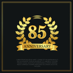 85 year anniversary celebration logo gold color design on black background abstract illustration  