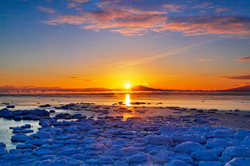 海別岳からの日の出と流氷（網走市） © itoh masako