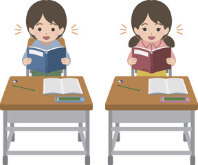 学習机に向かい起立して本を読む私服の児童