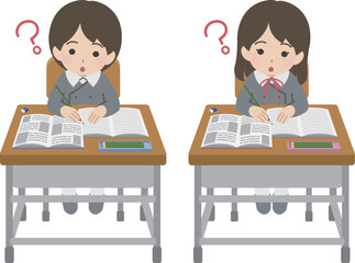 学習机に向かい疑問に思う制服の児童