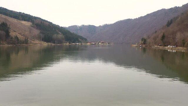aerial footage directly above the danube far into the air in the middle of the river in upper austria