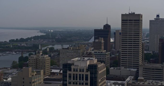Memphis Tennessee Aerial v70 flyover downtown district capturing urban cityscape of high rise buildings and skyscrapers along side of north main street - Shot with Inspire 2, X7 camera - May 2022