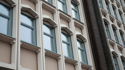 windows of a high-rise building close-up view from below