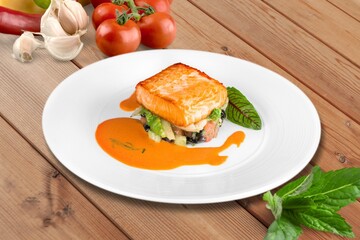 Tasty fresh Dish with fish fillet and salad