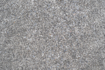 Small stones flooring texture or road stone background.
