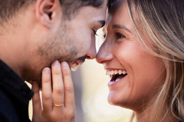 Couple, forehead touch and laugh together with happiness, comic moment or romance outdoor for date....