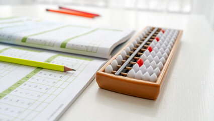 The boy is engaged in abacus, mental arithmetic for children