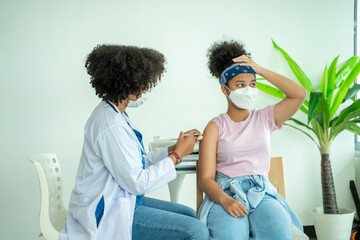 Doctor giving vaccination girl,Health,Prevention,Vaccine.