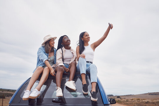 Road trip selfie of women friends on car roof with sky mockup for social media, group travel and vacation. Profile picture of diversity youth or people in Africa safari, desert or countryside journey