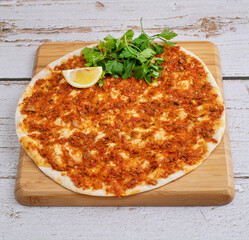 pizza on a wooden board