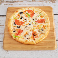 pizza on a board