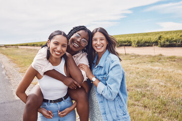 Portrait, friends and piggyback of women on holiday, vacation or trip outdoors. Group freedom, comic adventure and happy girls laughing at joke, having fun or enjoying quality time together in nature