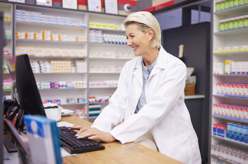 Pharmacy, computer database and senior woman pharmacist working of medicine research....