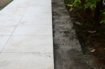 white tile and cement floor, construction industry