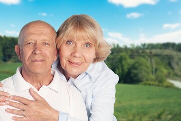 Mature old couple happy outdoors at farm