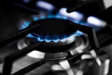 On the gas cooker, the flame burns with methane gas.