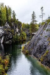 Fototapeta na wymiar Autumn view of Grand Marble Canyon of Ruskeala mountain park in Karelia.