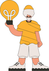 A handsome man is holding a light bulb. Idea theme.