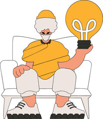 Presentable man holding a light bulb. Idea theme.