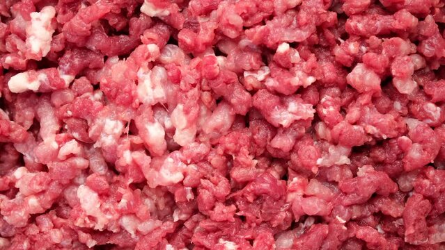 Raw minced meat mix pork and beef top view, rotation. Cooking minced meat