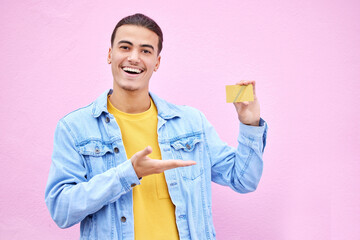 Happy, portrait and man with a bank card in a studio with a positive, optimistic and proud mindset....