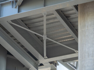 Close-up of X bracing steel frame.
Electric train passenger corridor project
