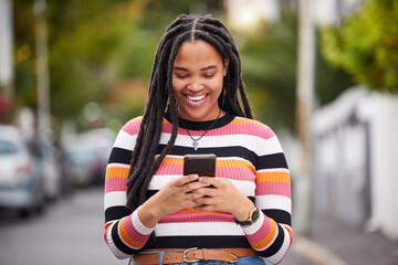 Black woman with smartphone in city, happy outdoor with technology, chat and communication, travel and fashion. Social media, urban street and adventure with happiness, connectivity and 5g in Jamaica