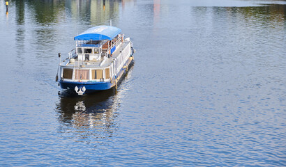 Fototapeta na wymiar summer river cruise boat navigation romantic old city journey