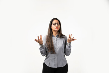 Mid age Asian Indian woman looking forward with confused expression