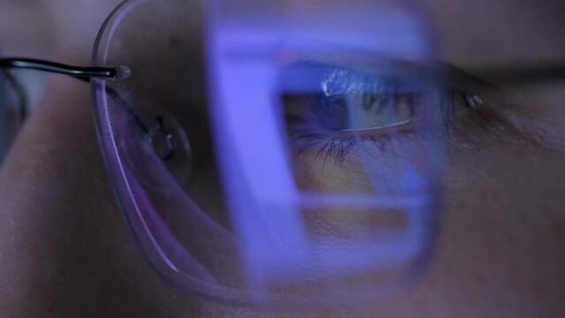 Portrait of Female Digital Entrepreneur Working on Computer, Line of Code Projected on His Face and Reflecting in Glasses. Developer Working on Innovative e-Commerce App using AI and Big Data