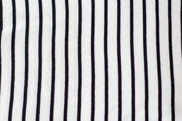 Striped white and black natural cotton fabric. Vertical stripes.