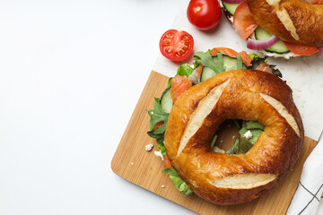 Concept of delicious food - tasty bagel sandwich, space for text