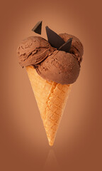 Chocolate ice cream in a waffle cone.