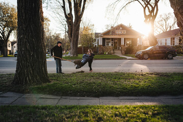 Kids Rake During  Fall Yard Work