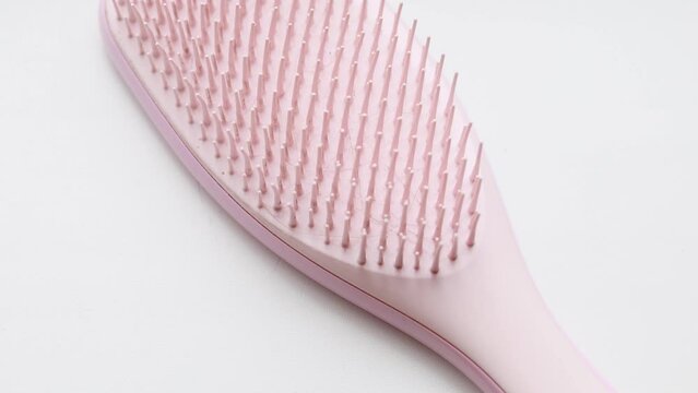 A dirty comb is placed on the table