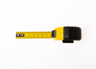 Yellow measuring tape isolated on white background.