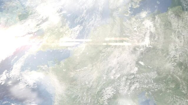 Earth zoom in from outer space to city. Zooming on Huy, Belgium. The animation continues by zoom out through clouds and atmosphere into space. Images from NASA