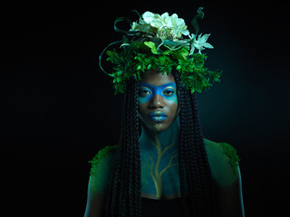 Black woman, portrait and plant crown beauty face and makeup on dark background with tropical leaf....