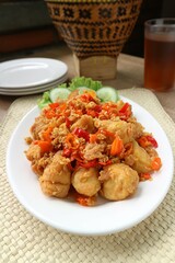 fried tofu with a sprinkling of cayenne pepper and salt 