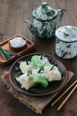 cake made from processed cassava sprinkled with grated coconut called kue getuk