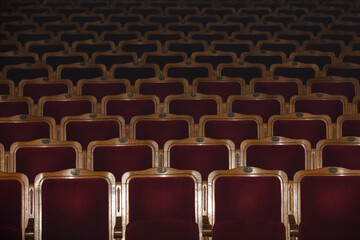 Row of red seats in theatre