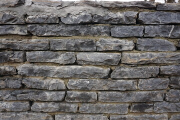 stone wall, stones aged gray color