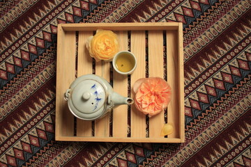 tea pot and cup with  vintage background in vintage background