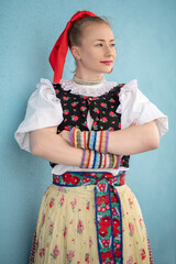 Young beautiful slovak woman in traditional dress. Slovak folklore
