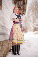 slovak folk costume. Young beautiful slovak woman in traditional dress. Slovak folklore
