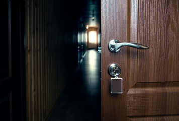 open door with lock, hotel room or apartment doorway with open door