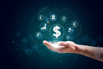 Hand touching a hologram of world map which represent currency in the world. World economy and finance, Banks and law of economy. Business global financial technology, Financial and banking.