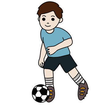 Boy playing soccer football