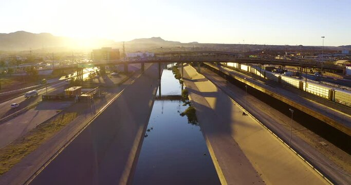 Rio Bravo river between El Paso and Juarez. Both flags waving proudly as a representation of the two countries' close relationship.