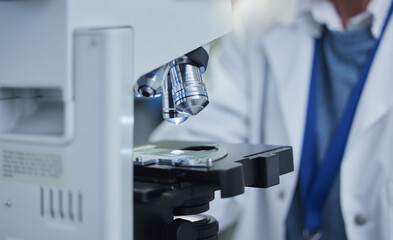 Science, sample and research with microscope in laboratory for medicine, pharmacy and vaccine cure....